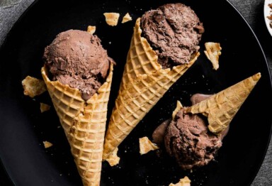 Three waffles cones filled with chocolate ice cream