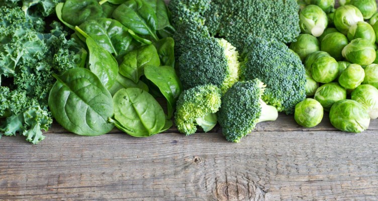 variety-of-green-vegetables-on-wood-table