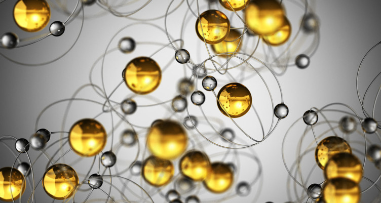 Gold droplets on gray background