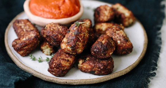 Plate of cauliflower tots and tomato sauce