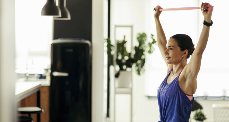 Woman working out with band