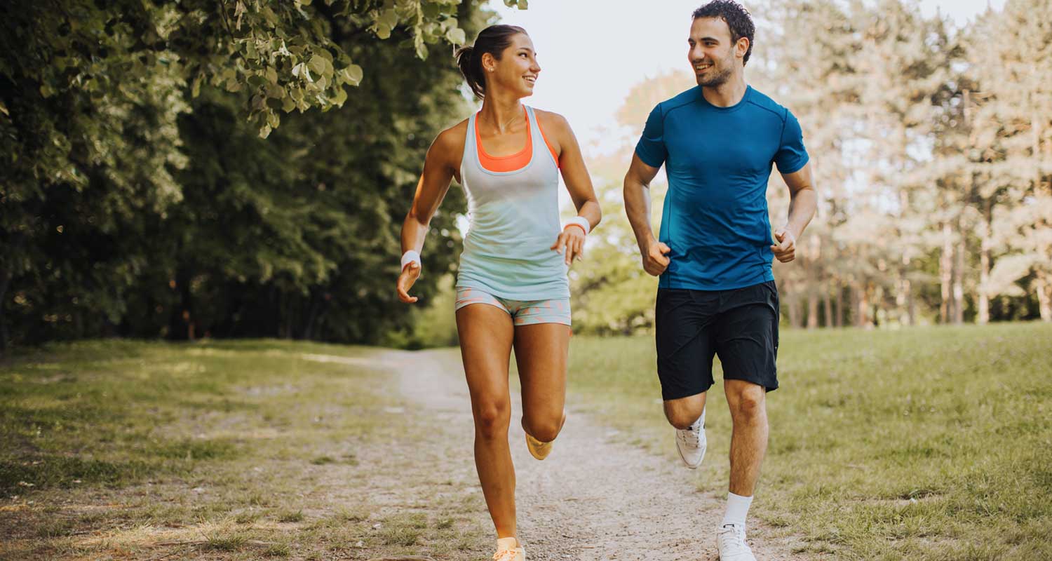 man and woman jogging